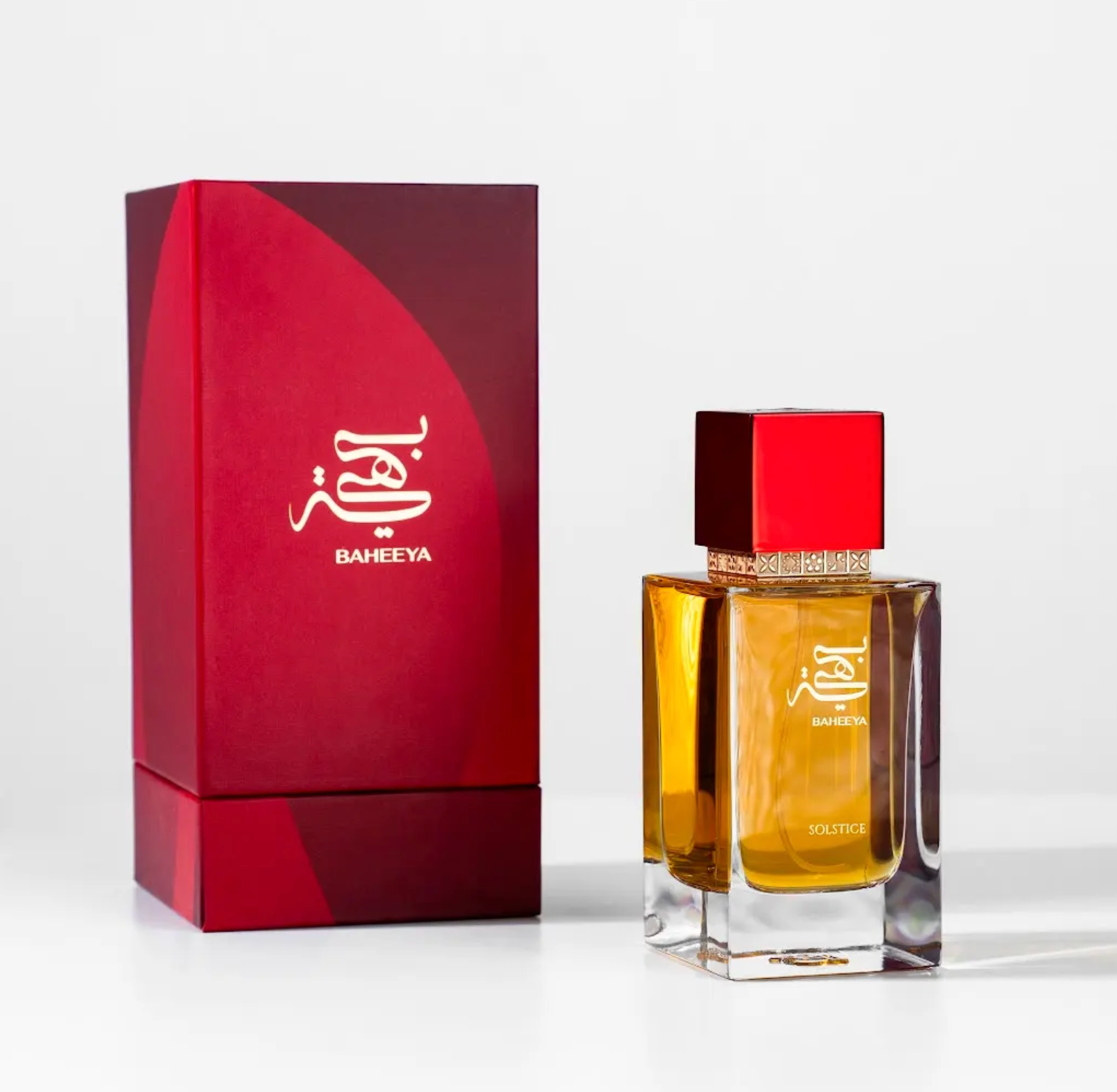 Perfume bottle and packaging with 'BAHEEYA' branding on a white background