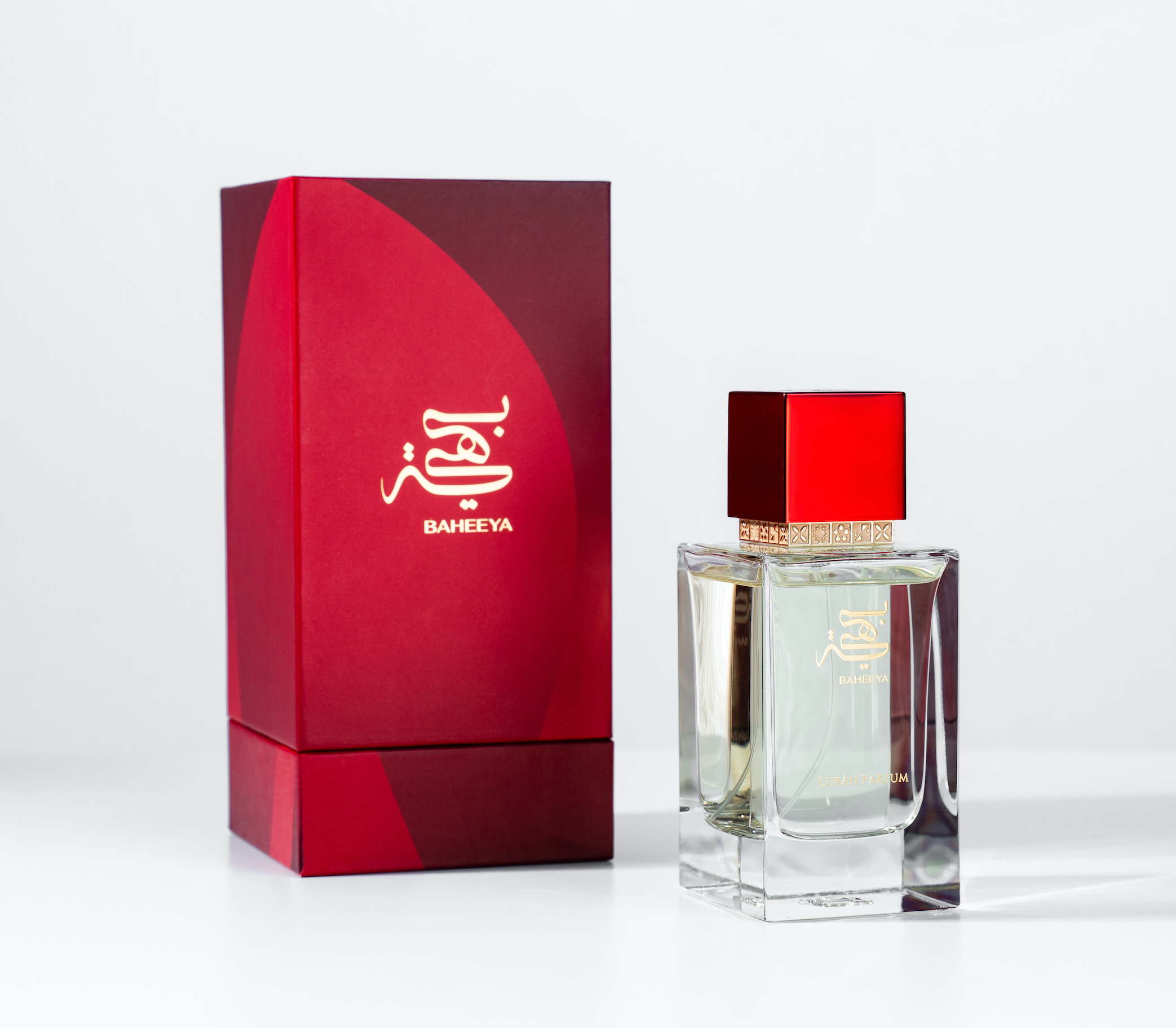 Perfume bottle and packaging with 'BAHEEYA' branding on a white background